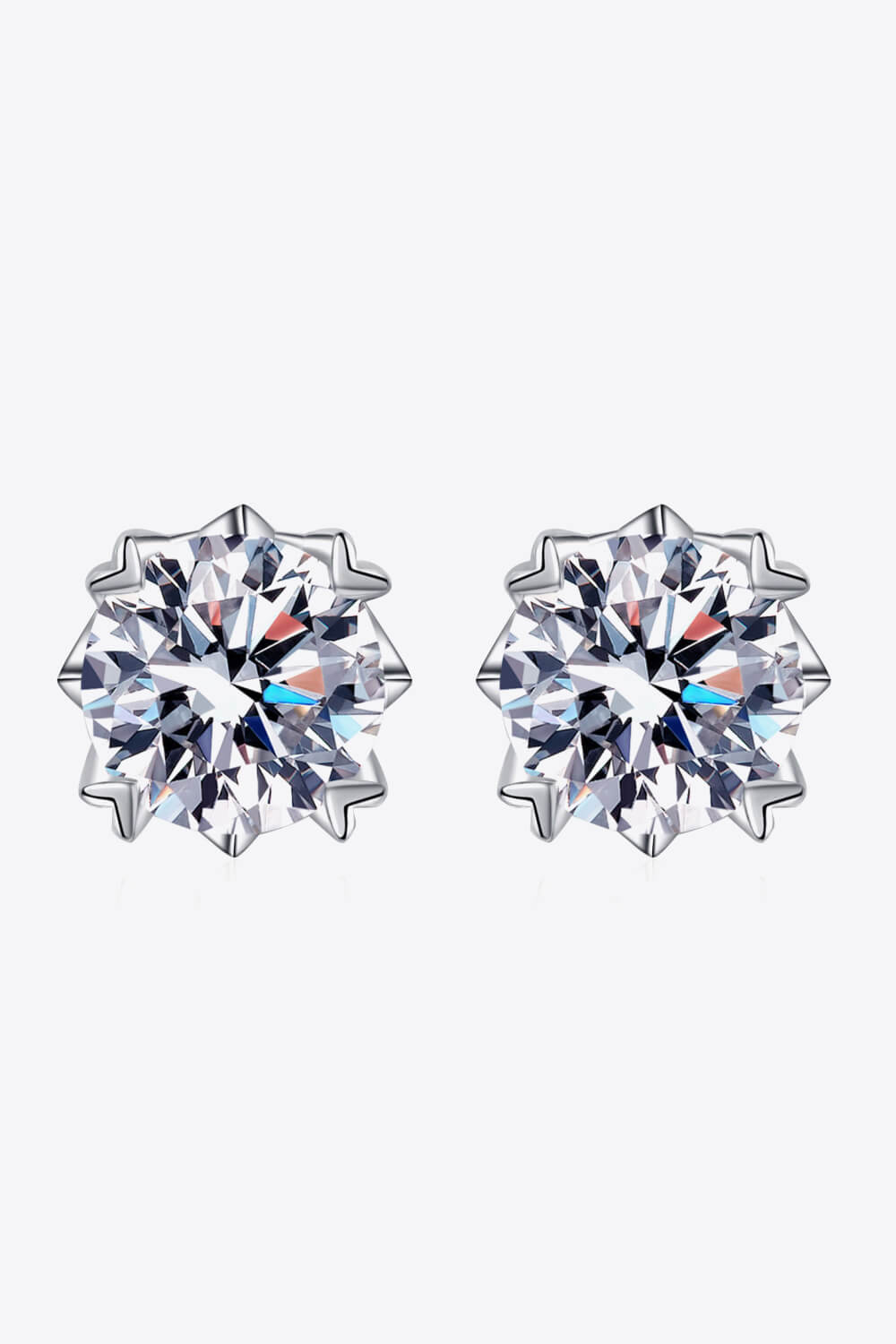 Sterling silver earrings, Lab-created gemstones, 4-carat statement studs, Sparkling centerpiece, Elegant stud design, Affordable luxury earrings, High-quality craftsmanship, Timeless beauty, Fine jewelry accessory, Moissanite stud earrings.