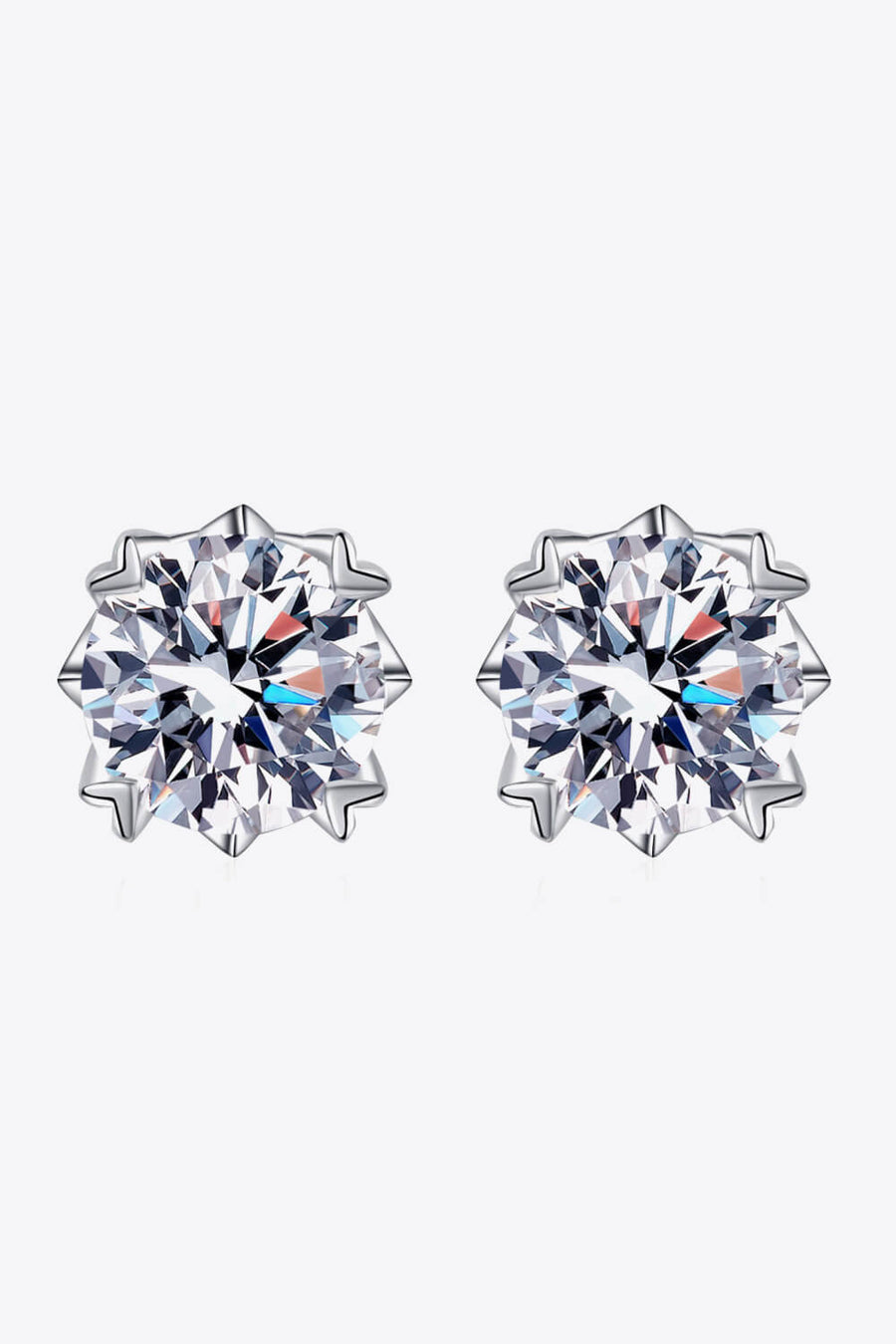 Sterling silver earrings, Lab-created gemstones, 4-carat statement studs, Sparkling centerpiece, Elegant stud design, Affordable luxury earrings, High-quality craftsmanship, Timeless beauty, Fine jewelry accessory, Moissanite stud earrings.