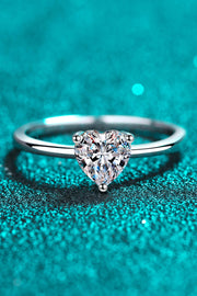 Sterling silver ring, Heart-shaped Moissanite, Solitaire ring, Elegant jewelry, Sparkling centerpiece, Fine silver accessory, High-quality craftsmanship, Timeless beauty, Romantic ring, Affordable luxury.