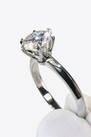 Sterling silver ring, Lab-created gemstone, 3-carat statement piece, Sparkling centerpiece, Elegant six-prong setting, Affordable luxury ring, High-quality craftsmanship, Timeless beauty, Fine jewelry accessory, Moissanite solitaire ring.