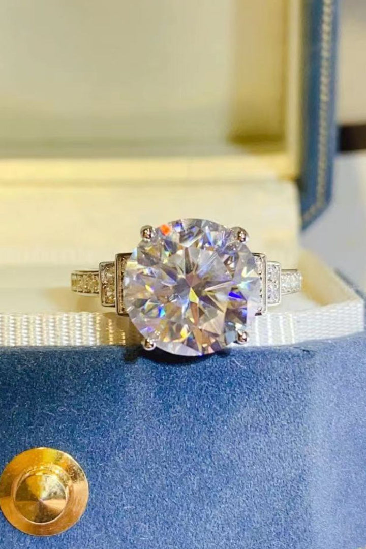 Moissanite silver ring, Sterling silver jewelry, Lab-created gemstone, 5-carat statement ring, Sparkling centerpiece, Affordable luxury ring, Elegant sterling silver band, High-quality craftsmanship, Timeless beauty, Fine jewelry accessory.