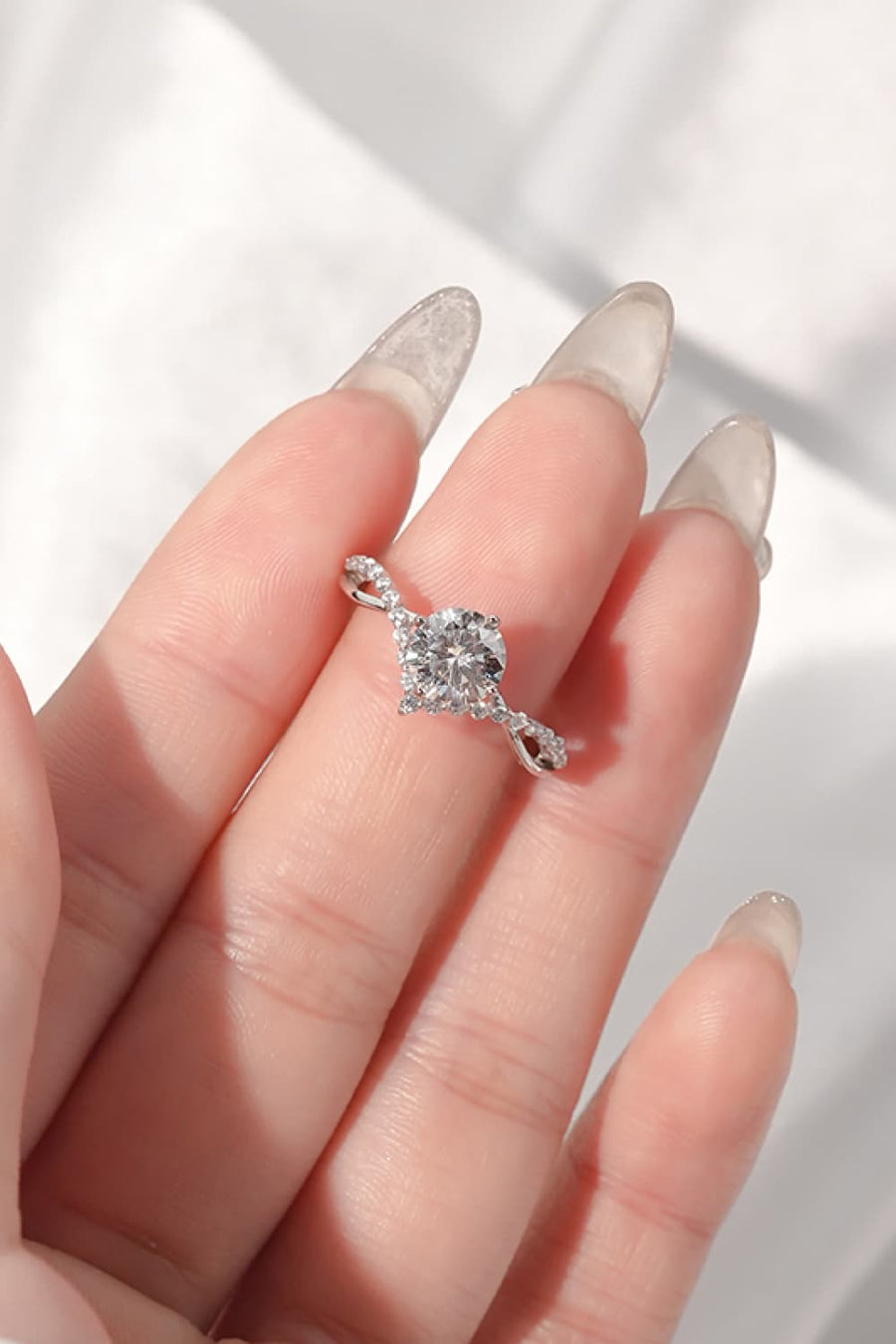 1 Carat Moissanite Ring, Sterling Silver Ring, Moissanite Solitaire Ring, Sparkling Gemstone Ring, Ethical Jewelry, Luxurious Silver Ring, Elegant Moissanite Jewelry, Timeless Solitaire Design, Affordable Luxury Ring, Statement Moissanite Ring.