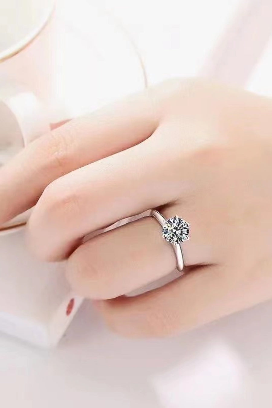 Sterling silver ring, Lab-created gemstone, 3-carat statement piece, Sparkling centerpiece, Elegant six-prong setting, Affordable luxury ring, High-quality craftsmanship, Timeless beauty, Fine jewelry accessory, Moissanite solitaire ring.