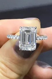Moissanite side stone ring, Lab-created gemstone, 5-carat statement piece, Sparkling centerpiece, Side stone accent ring, Luxury jewelry, Elegant design, High-quality craftsmanship, Affordable glamour, Fine jewelry accessory.