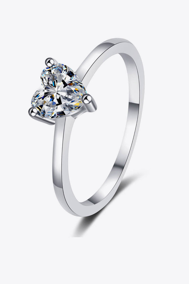Sterling silver ring, Heart-shaped Moissanite, Solitaire ring, Elegant jewelry, Sparkling centerpiece, Fine silver accessory, High-quality craftsmanship, Timeless beauty, Romantic ring, Affordable luxury.